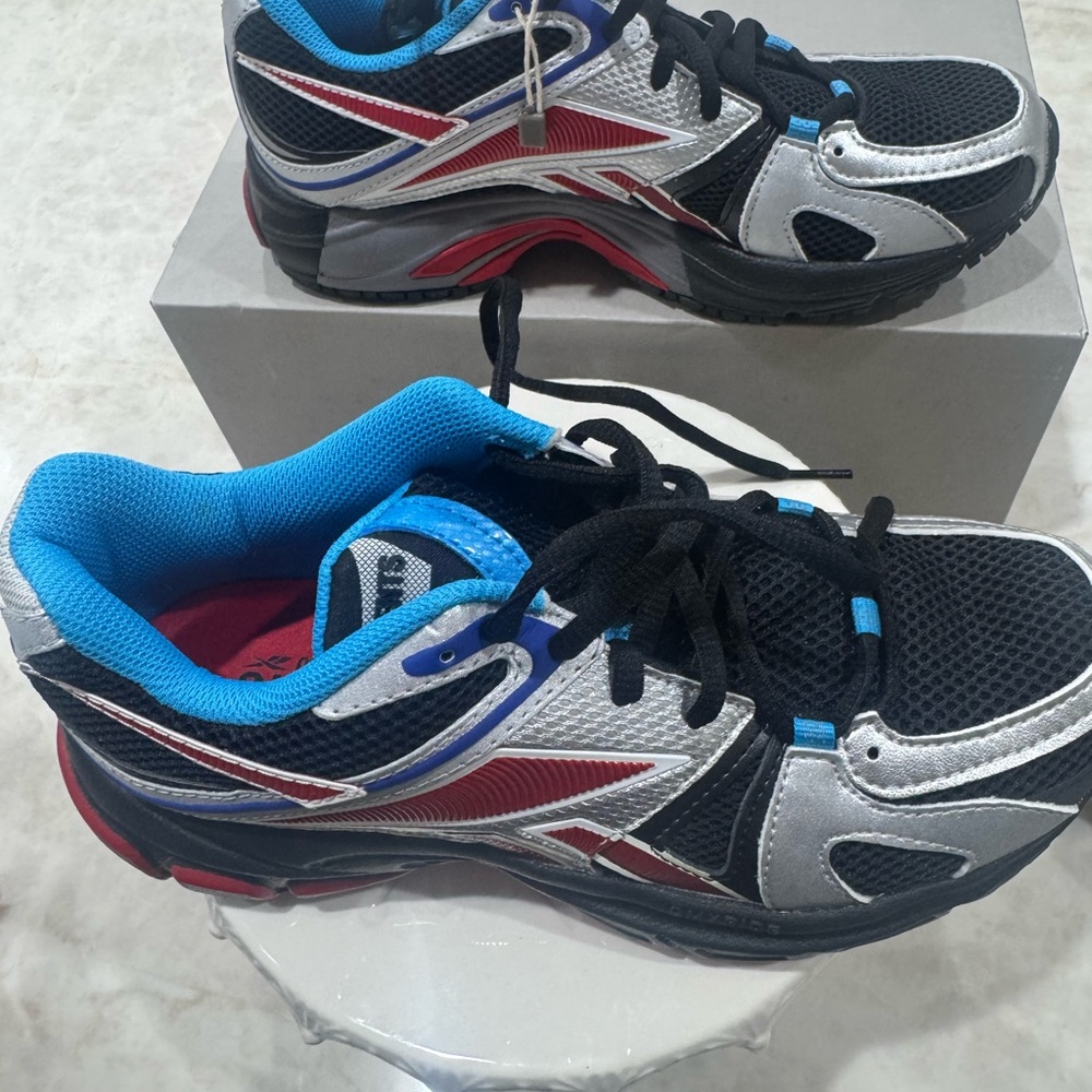 Unisex Vetements Black, Blue, and Silver Athletic Shoes
